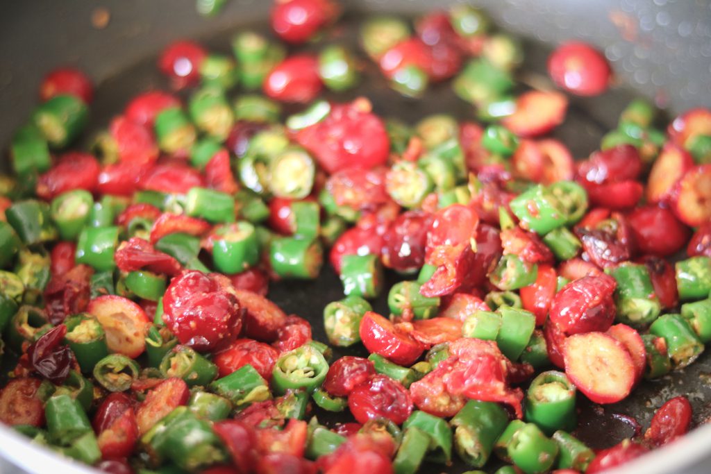 sautéed cranberries and green chillies