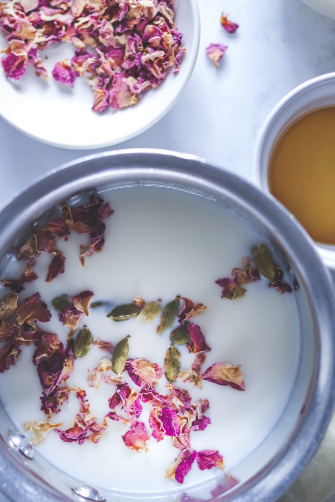 milk infused with roses and cardamoms, honey in a bowl