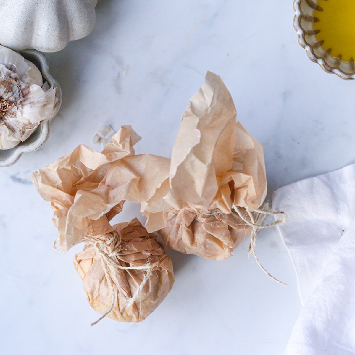 Garlic wrapped in parchment paper