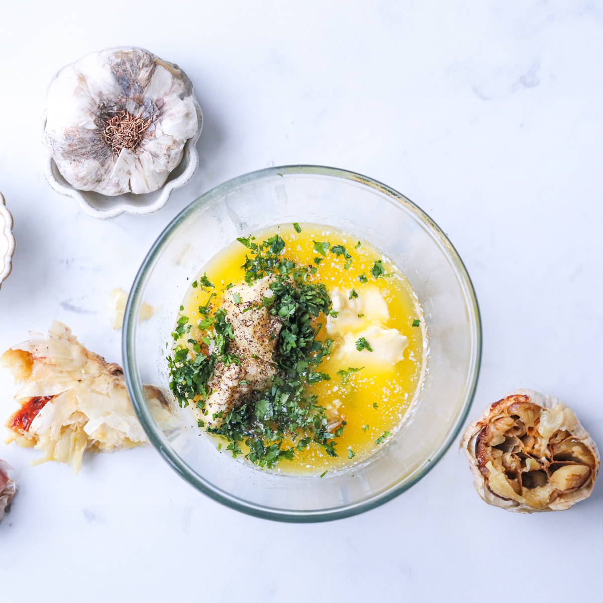 Combine the ingredients to make roasted garlic butter 